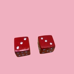 Red Dice Made with White Dots and Metal